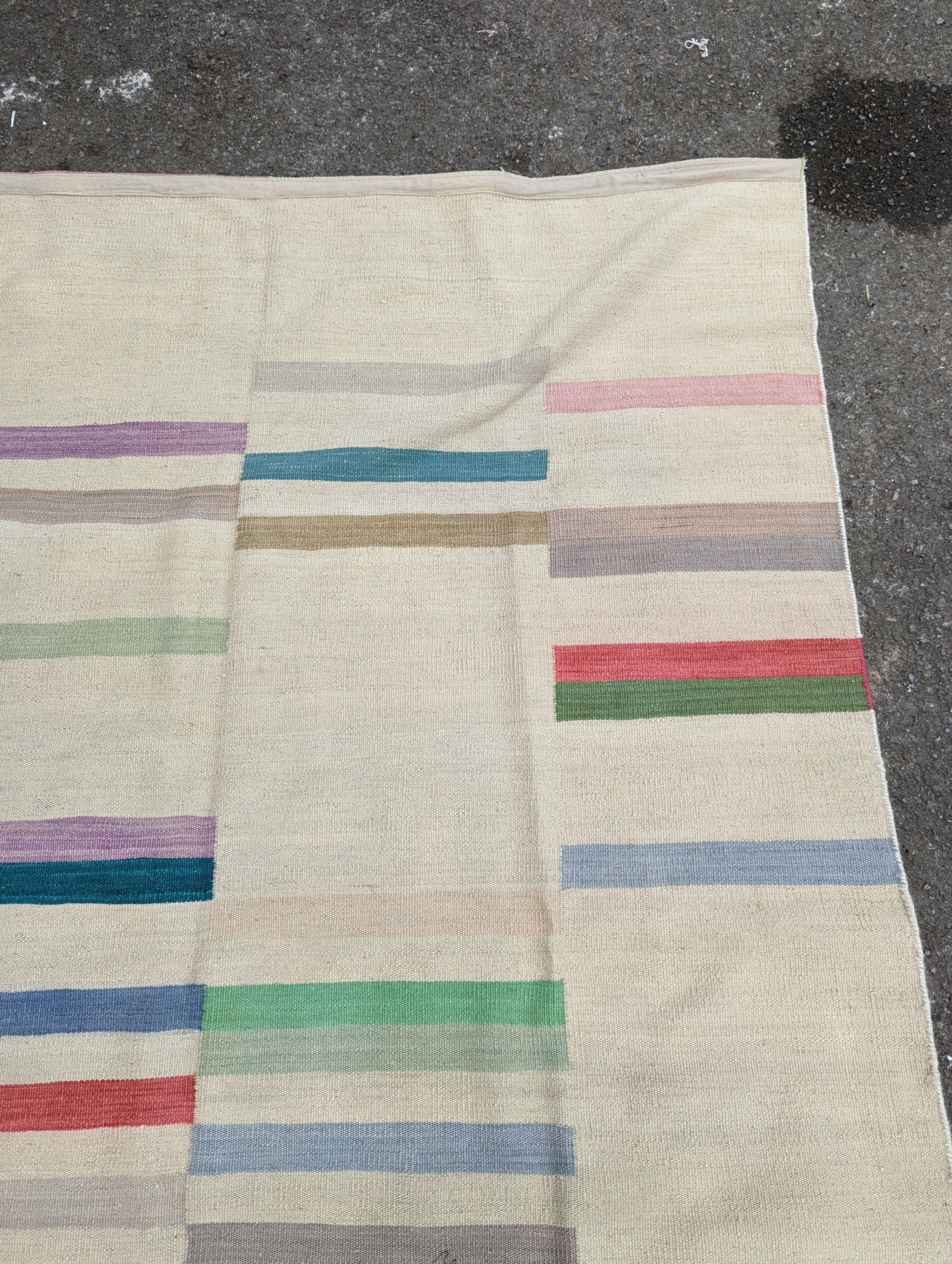 A contemporary Paul Smith inspired Kilim carpet, approx. 200 x 120